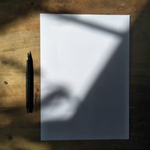 alt text: image is a color photograph of a pen and piece of paper; title card for the short story "Always with You" by Robert Maynor