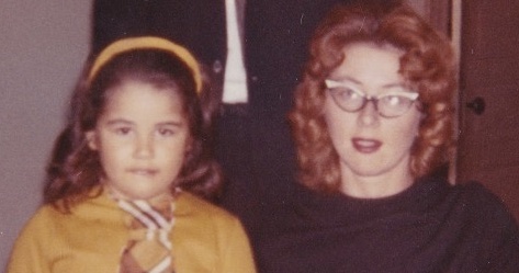 Image is a photograph of a Rowan as a girl with her mother.